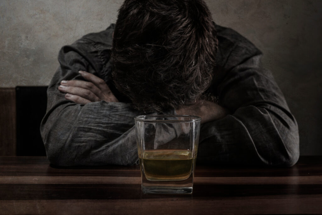 Alcohol, depressed man
