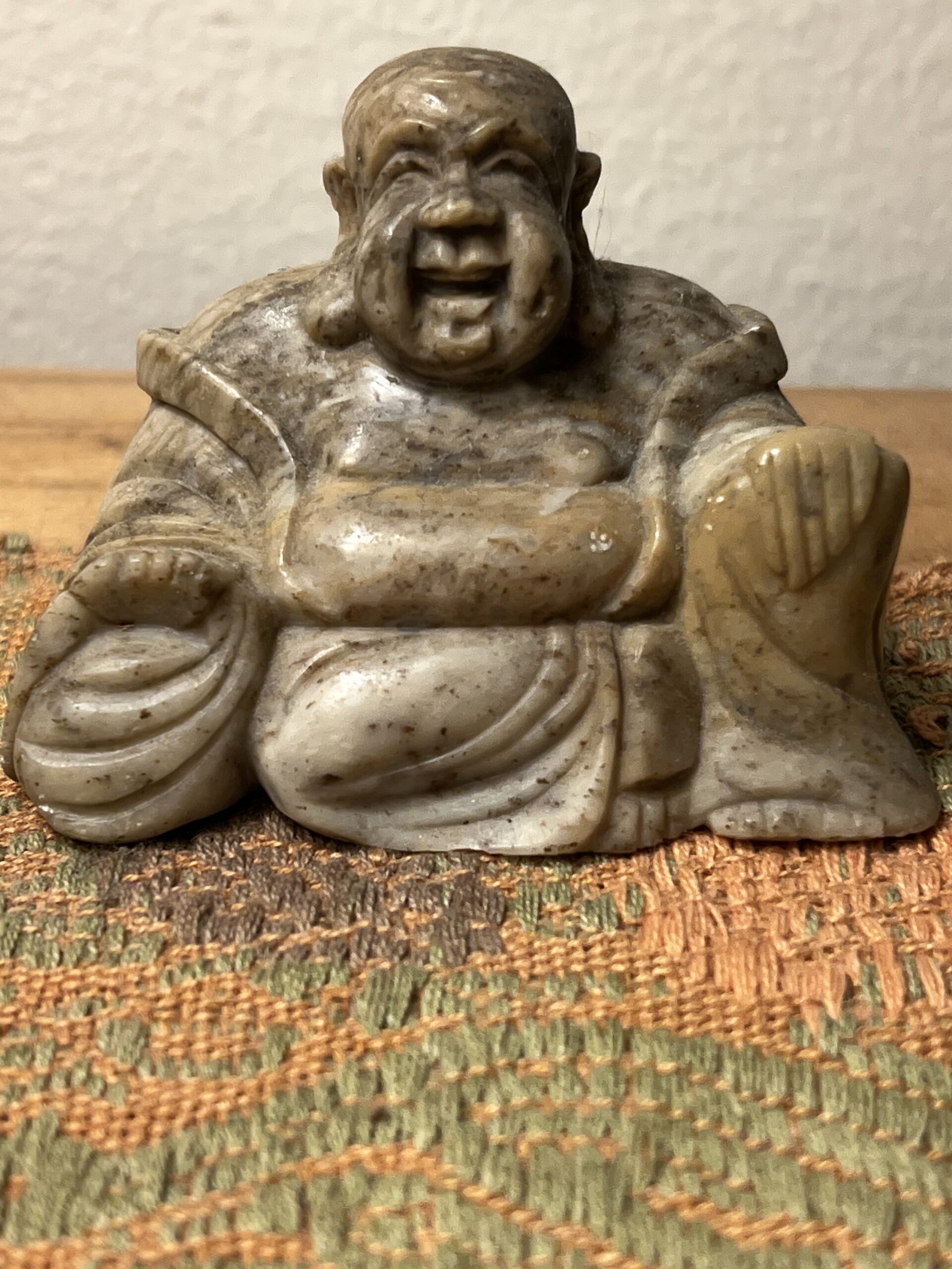 Budai, a nickname given to a tenth-century Chinese monk, often referred to as 